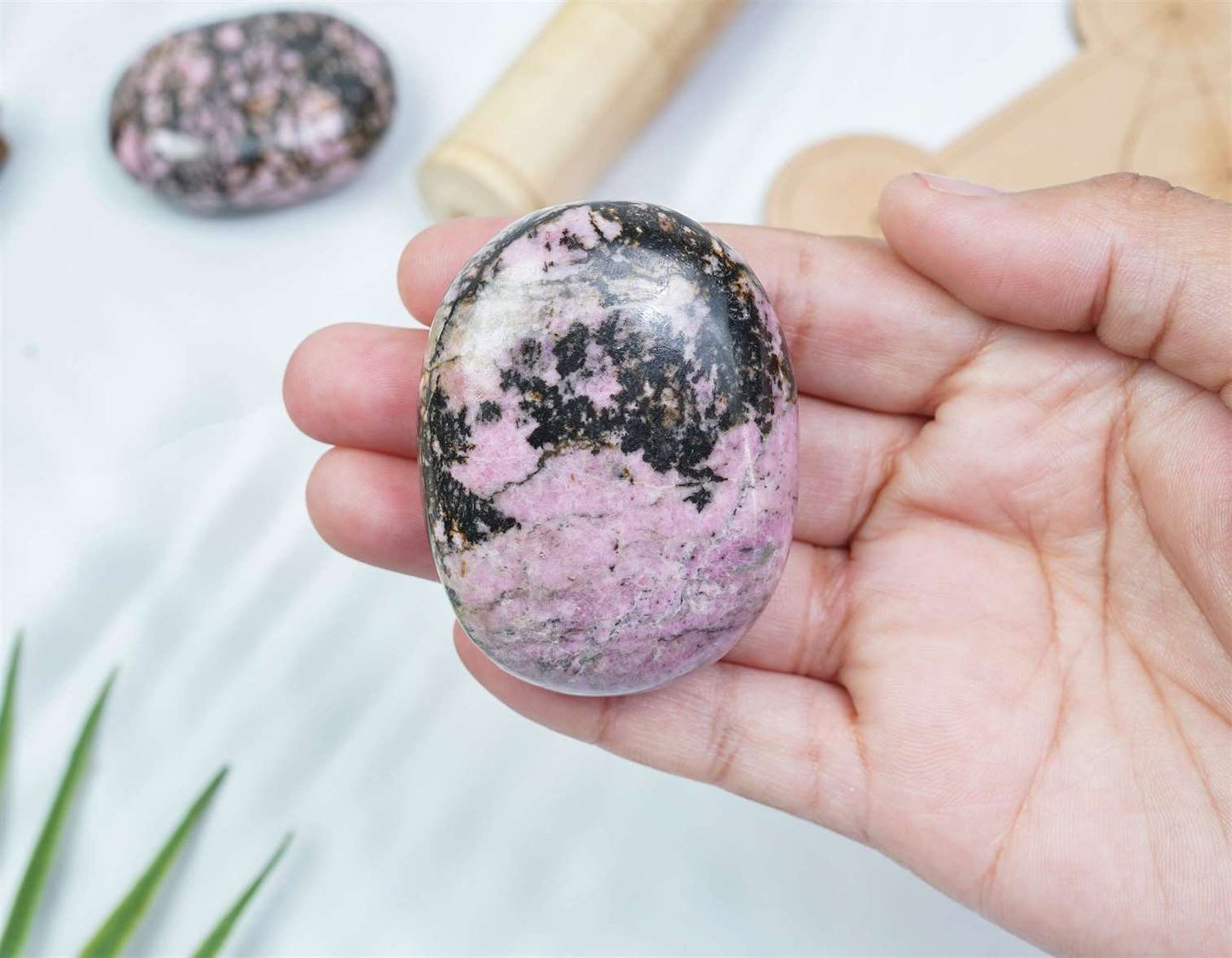 Rhodonite Crystal Palmstone (Emotional Healing, Support Forgiveness) - TheIndianHand